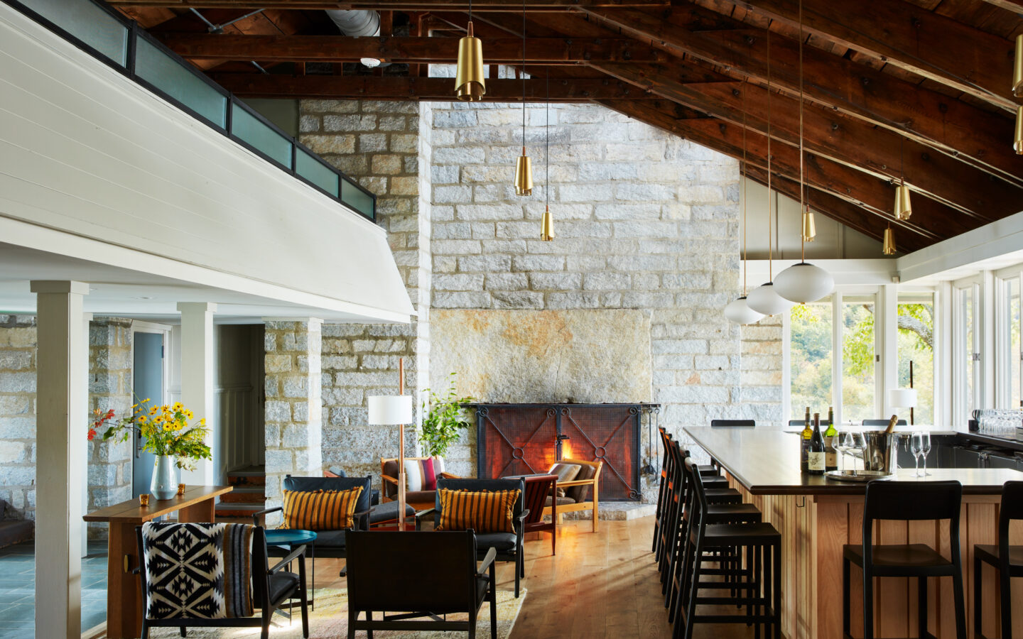 rendering of the bar area with a blazing fire in the fireplace
